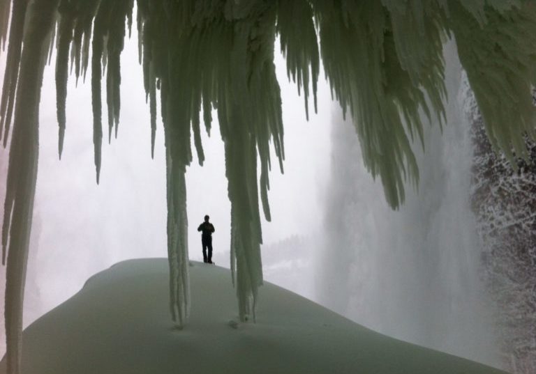 Climbing Helmcken Falls. Chris under the daggers