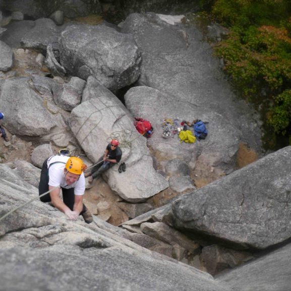 Dr. Nigel Aspinal rock climbing